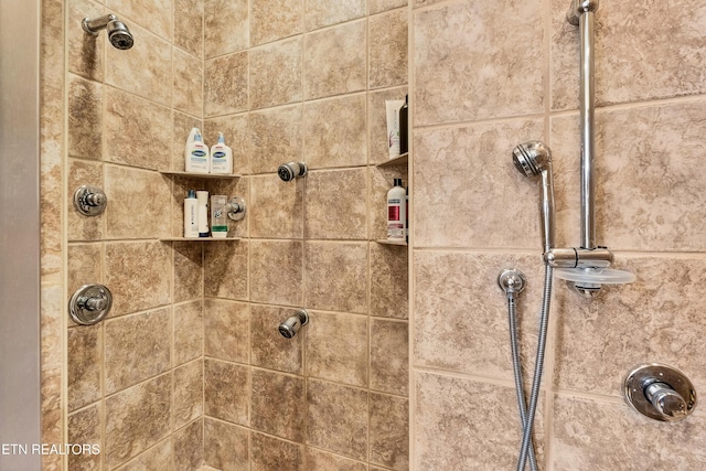 details with a tile shower