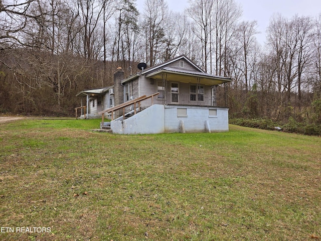 exterior space featuring a front lawn