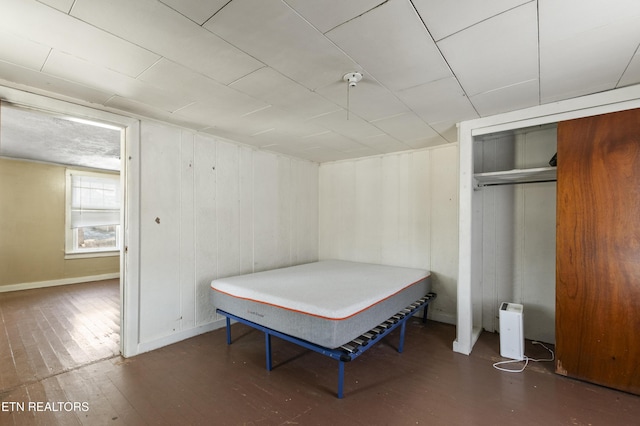 1886 5th St, Jellico, TN 37762 - bedroom with dark wood-type flooring and a closet