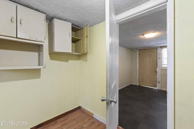 1886 5th St, Jellico, TN 37762 - washroom with a textured ceiling