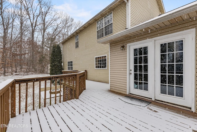 view of snow covered deck