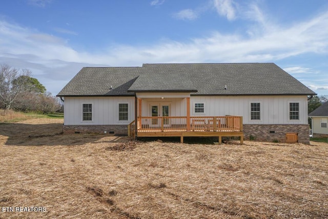 back of house with french doors and a wooden deck