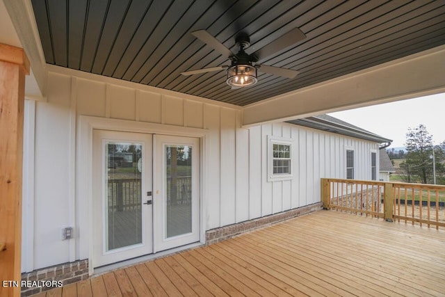 wooden deck with french doors and ceiling fan