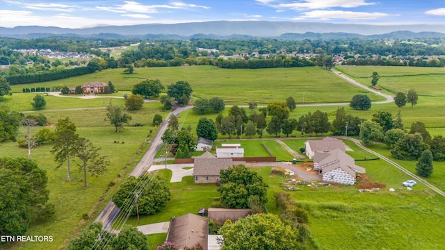 bird's eye view with a mountain view and a rural view