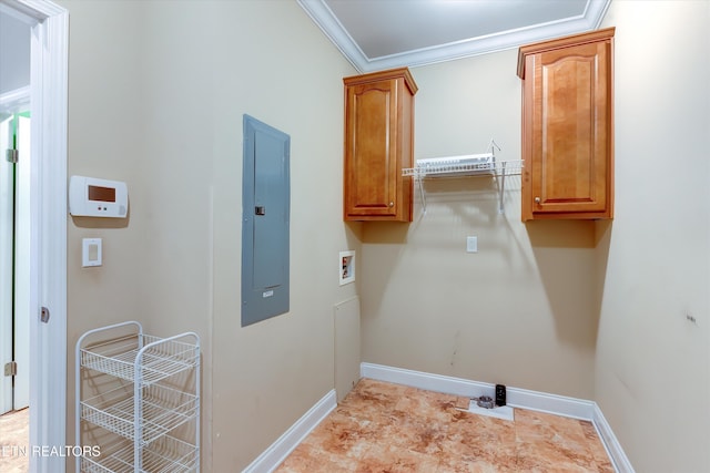 laundry area featuring cabinets, washer hookup, electric panel, and ornamental molding