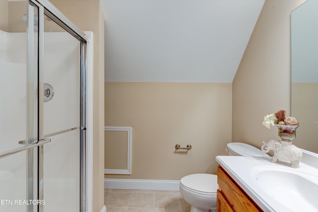 bathroom featuring walk in shower, tile patterned floors, vaulted ceiling, toilet, and vanity