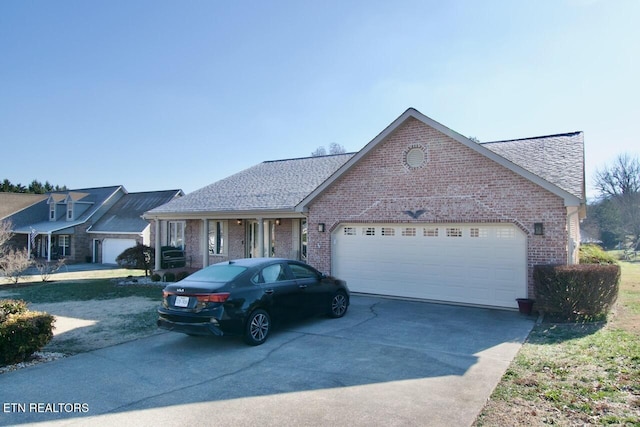 ranch-style house featuring a garage