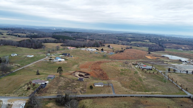 aerial view featuring a water view and a rural view