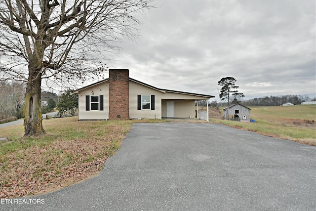 exterior space with a carport