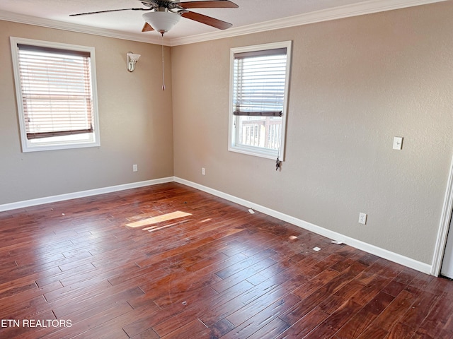 unfurnished room with ornamental molding, dark hardwood / wood-style floors, and ceiling fan