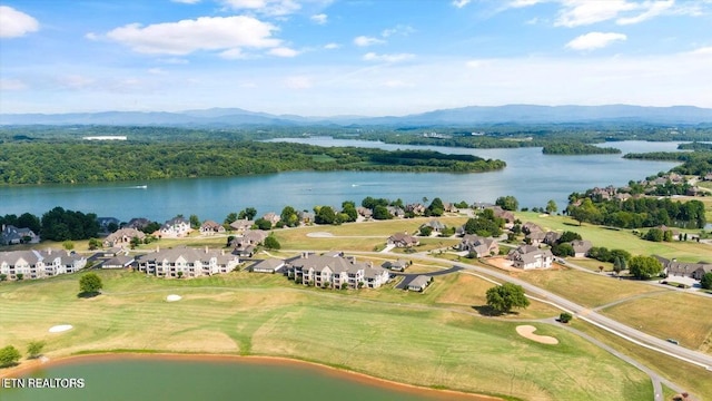 bird's eye view featuring a water and mountain view