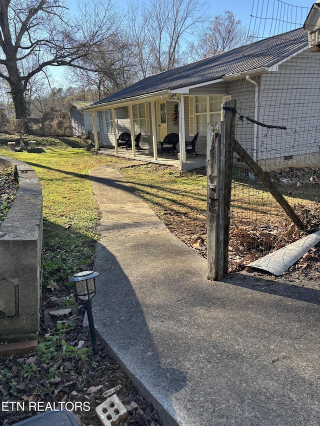 view of yard featuring a porch