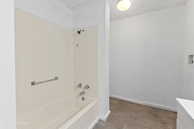 bathroom with vanity and  shower combination