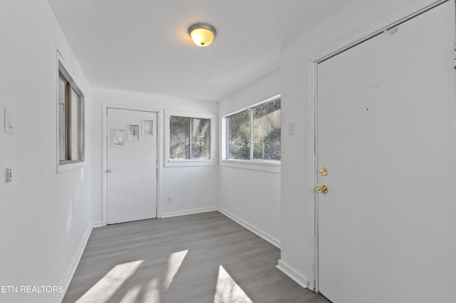 entryway with light hardwood / wood-style floors