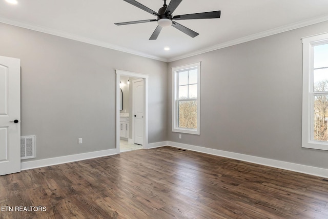 unfurnished room with ornamental molding, dark hardwood / wood-style flooring, and ceiling fan