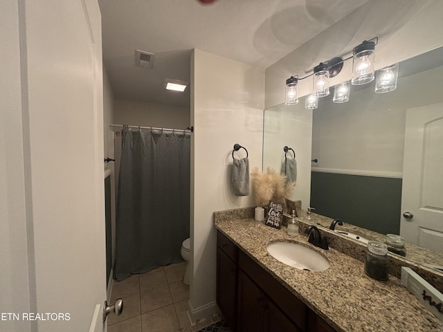 full bathroom featuring tile patterned flooring, toilet, a shower with shower curtain, vanity, and visible vents