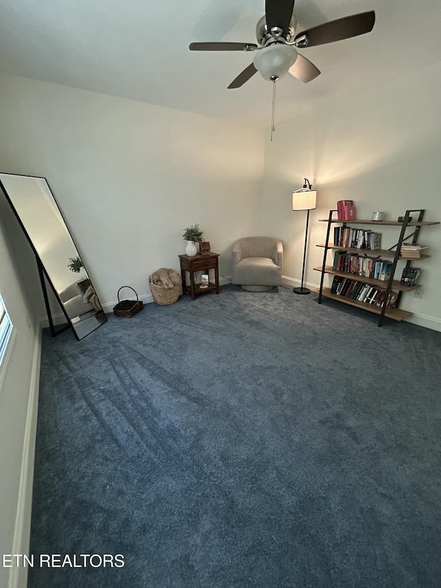 unfurnished room with carpet floors and baseboards