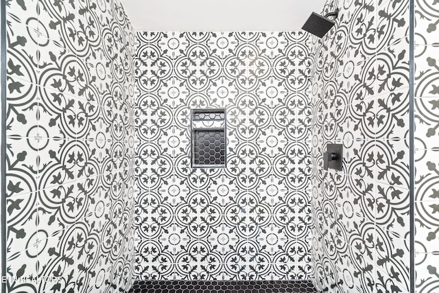 details with a tile shower