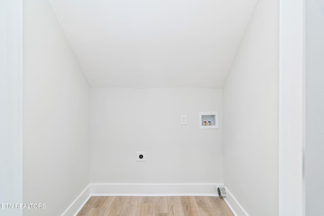 laundry room with hookup for an electric dryer, washer hookup, and light hardwood / wood-style floors