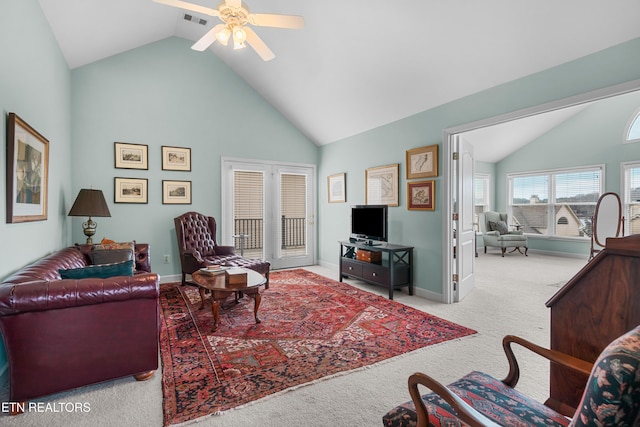 living room featuring baseboards, visible vents, ceiling fan, carpet flooring, and high vaulted ceiling