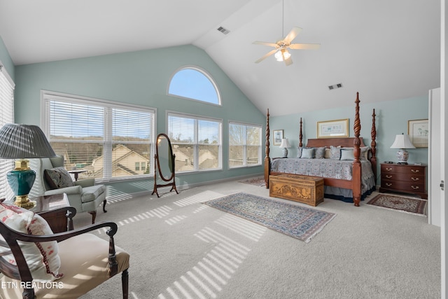 bedroom featuring high vaulted ceiling, carpet flooring, visible vents, and a ceiling fan