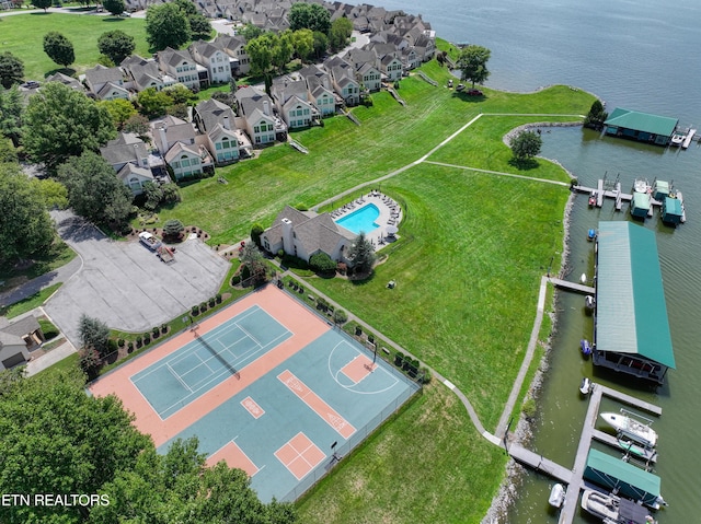 bird's eye view with a water view and a residential view