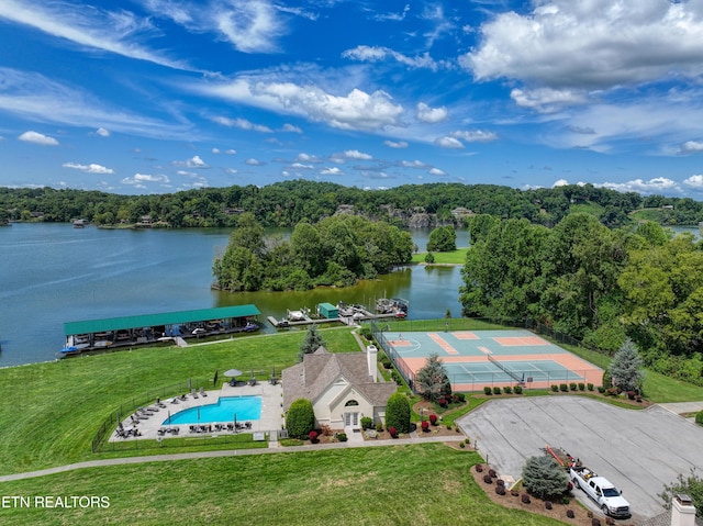 aerial view featuring a water view and a view of trees