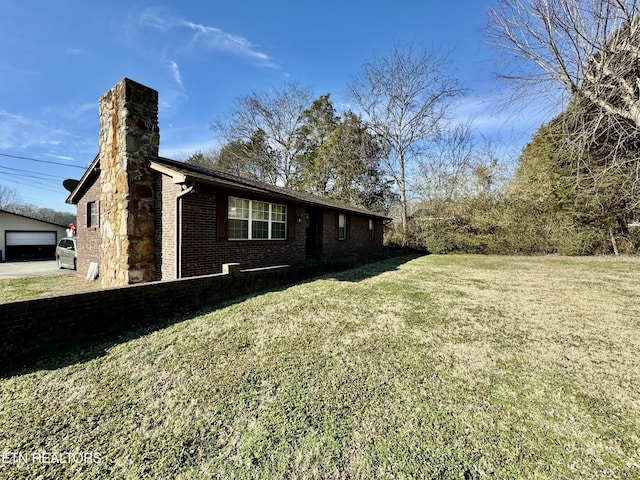 view of home's exterior with a lawn