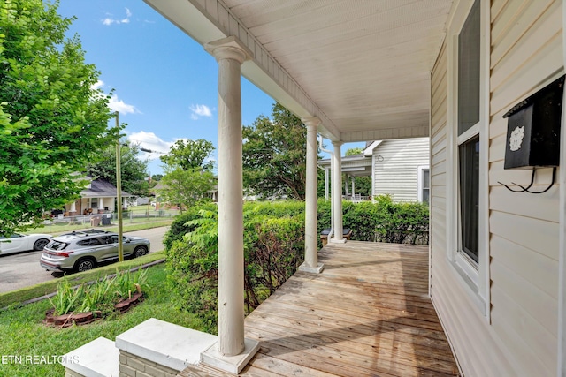 wooden deck featuring a porch