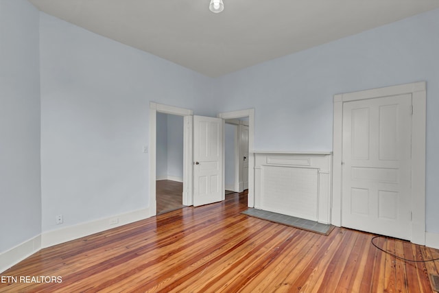 unfurnished bedroom with light hardwood / wood-style floors