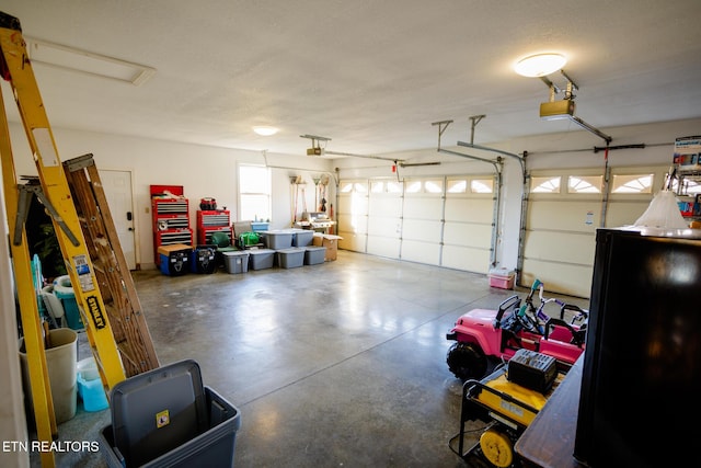 garage featuring a garage door opener