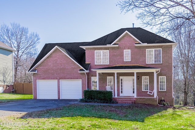 view of property featuring covered porch