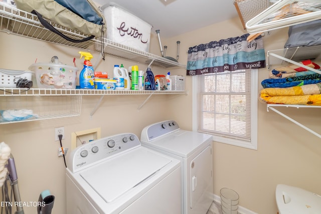 laundry area featuring washer and clothes dryer