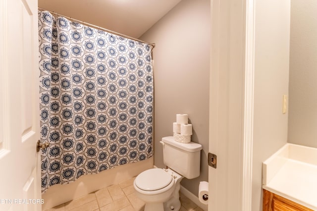 bathroom featuring tile patterned floors, vanity, and toilet