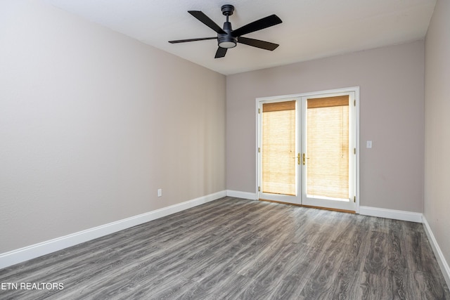 unfurnished room with dark hardwood / wood-style floors and ceiling fan