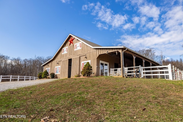 view of front of home with an outbuilding