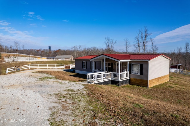 manufactured / mobile home with a porch