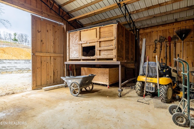 garage with wood walls