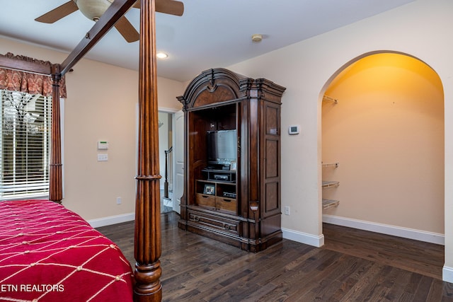 bedroom featuring ceiling fan and dark hardwood / wood-style flooring