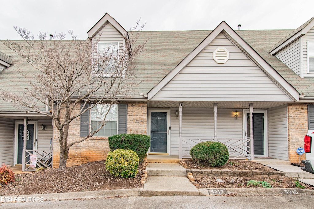 view of front of home featuring covered porch