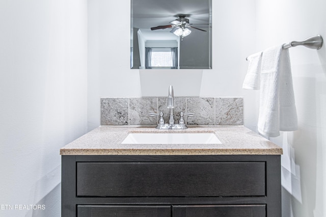 bathroom featuring vanity and ceiling fan