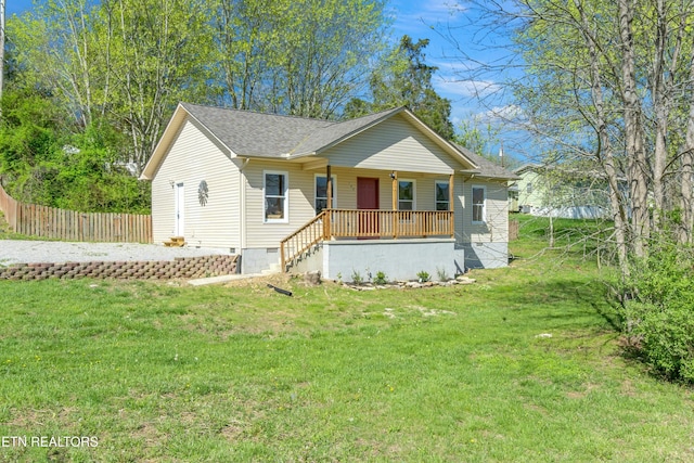 view of front of home with a porch and a front lawn