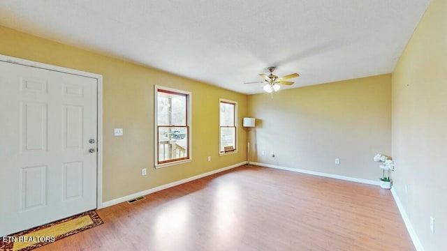 interior space featuring ceiling fan and light hardwood / wood-style floors