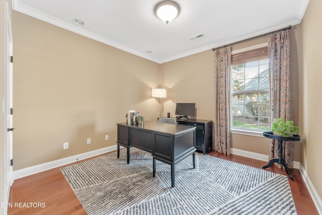 office space featuring ornamental molding and wood-type flooring