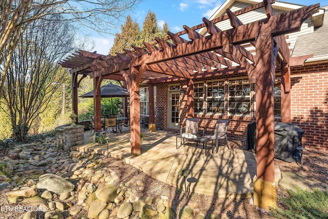 view of patio with a pergola