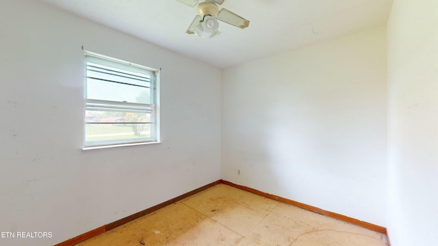 spare room with ceiling fan