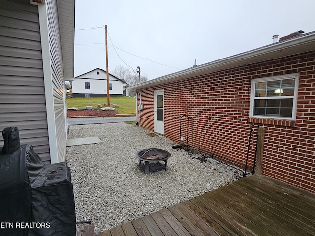 deck with a fire pit