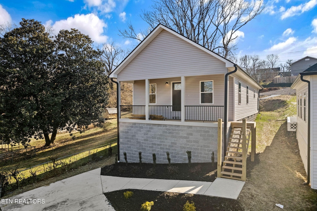 bungalow-style home with a porch