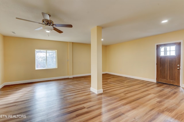 interior space featuring ceiling fan and light wood-type flooring