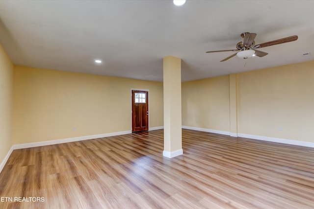 interior space with ceiling fan and light wood-type flooring